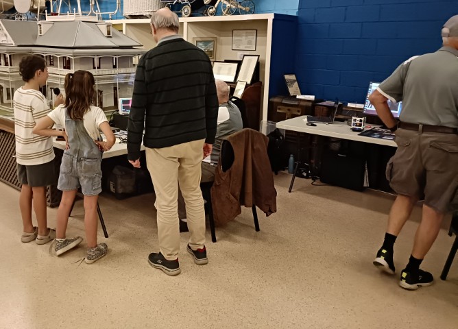 John and Bill showing youngsters Morse
