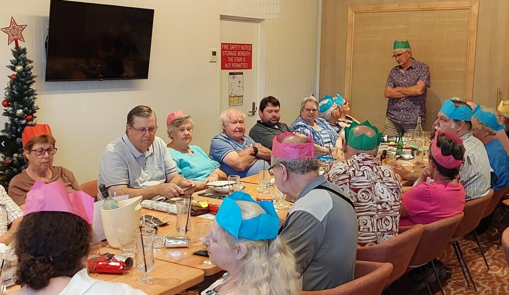 Table with members celebrating